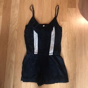 Black romper with cream lace detailing